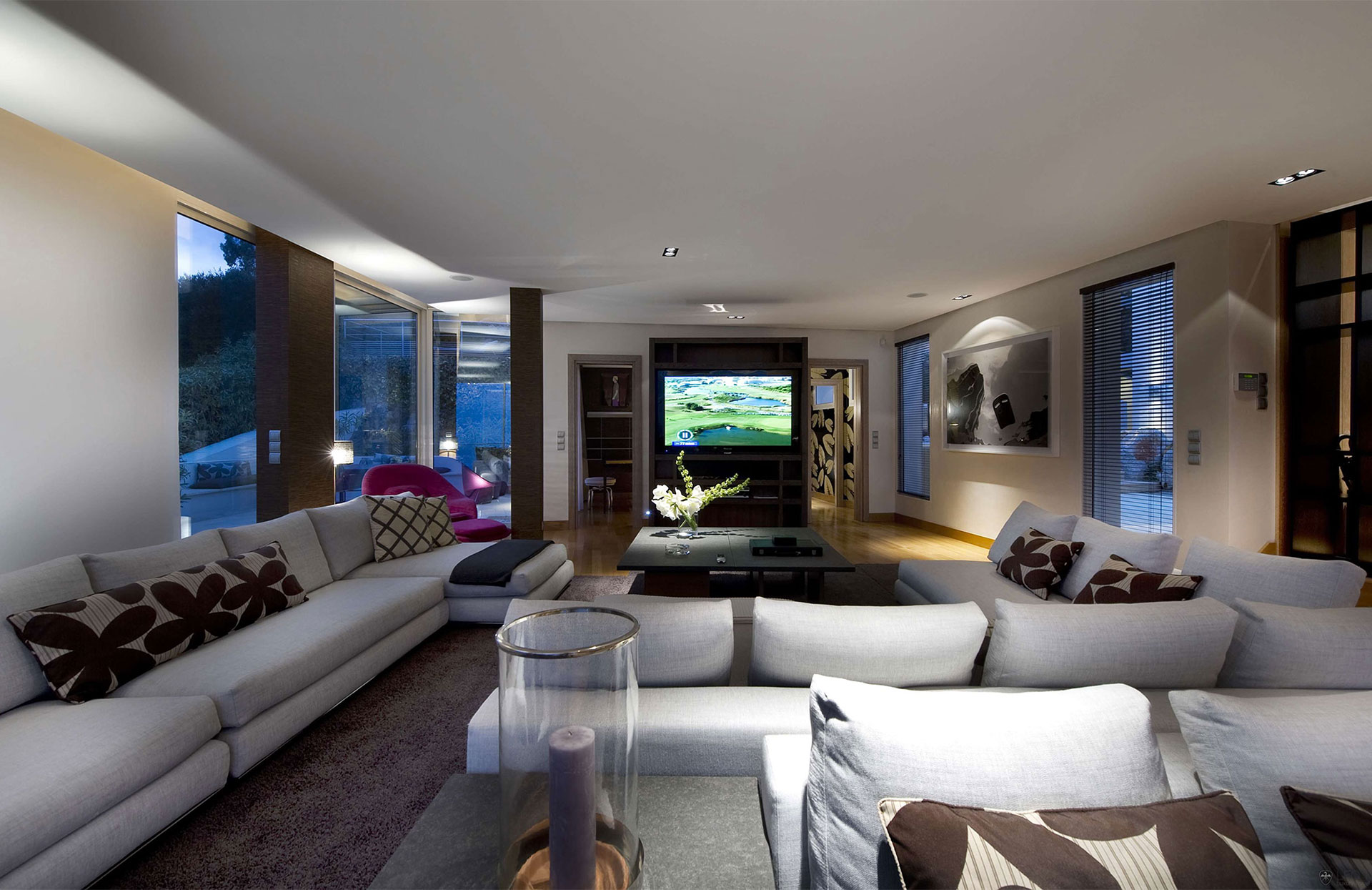 large-modern-living-room-design-with-white-chaise-lounge-sofa-bed-and-wood-LED-tv-cabinet-designs